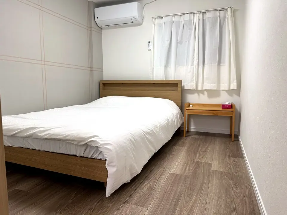 宽居民宿西式卧室与双人床实拍